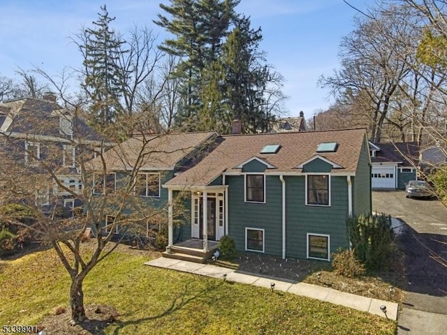 split foyer home with a front lawn