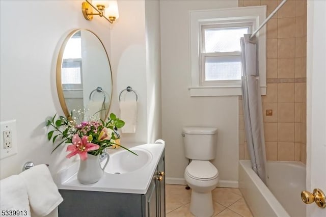 bathroom featuring toilet, shower / tub combo, vanity, baseboards, and tile patterned floors