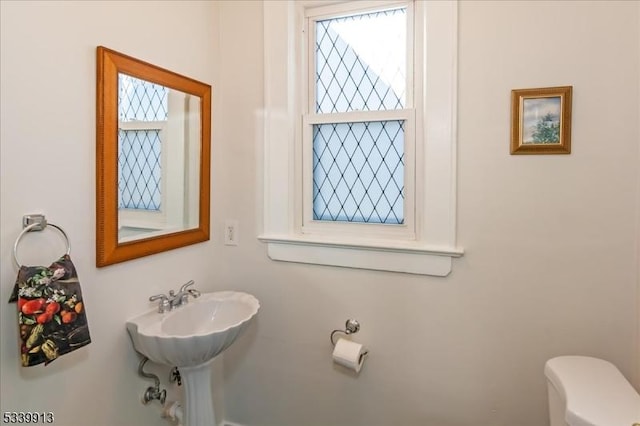 bathroom featuring a sink and toilet