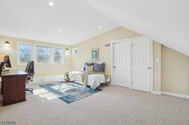 bedroom with baseboards, visible vents, light colored carpet, lofted ceiling, and recessed lighting