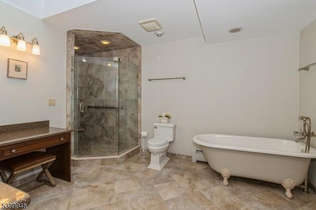 full bath with a freestanding bath, vanity, a shower stall, and toilet