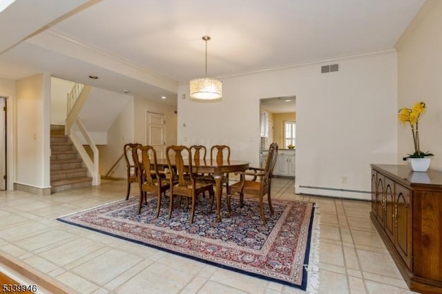 dining room featuring ornamental molding, visible vents, stairway, and baseboard heating