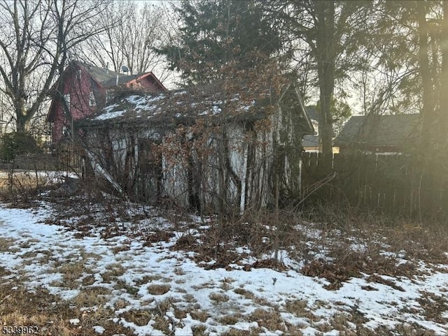 view of snow covered property