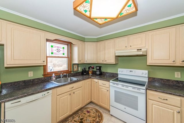 kitchen featuring under cabinet range hood, a sink, dark countertops, white appliances, and light tile patterned flooring