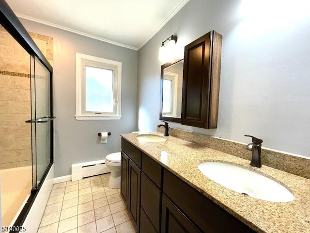 full bathroom with a shower stall, baseboard heating, a sink, and crown molding