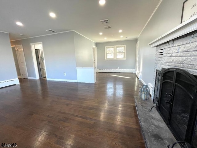 living room with a fireplace, a baseboard radiator, visible vents, dark wood-type flooring, and baseboards