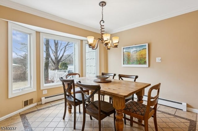 dining area featuring visible vents, ornamental molding, baseboards, and a baseboard radiator