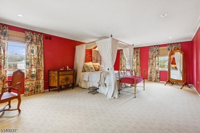 carpeted bedroom featuring recessed lighting, visible vents, multiple windows, and crown molding