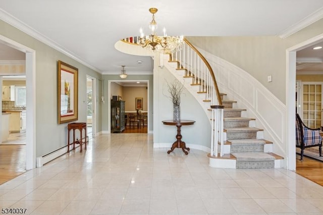 stairs with tile patterned flooring, crown molding, and baseboard heating