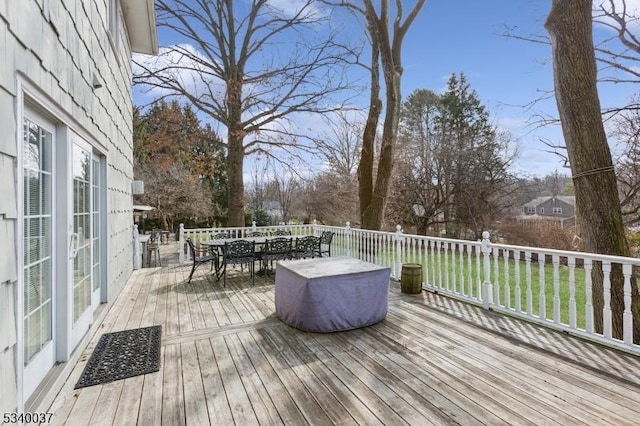 wooden deck with outdoor dining area