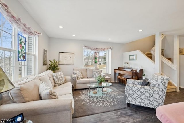 living room featuring recessed lighting, stairway, baseboards, and wood finished floors