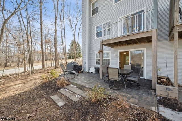 view of patio with a balcony