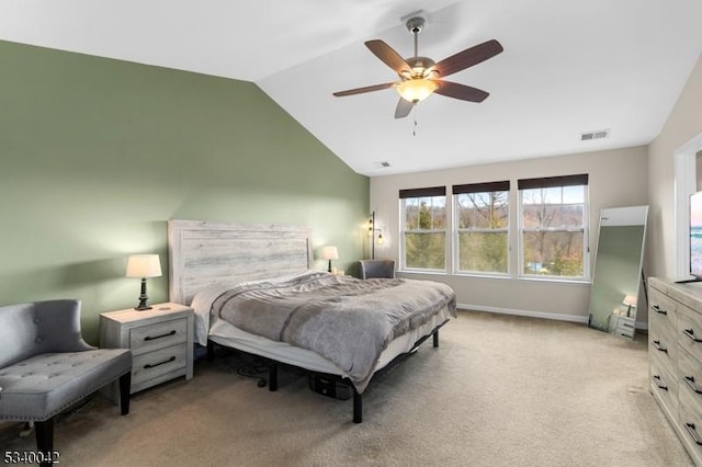 bedroom with lofted ceiling, visible vents, a ceiling fan, light carpet, and baseboards