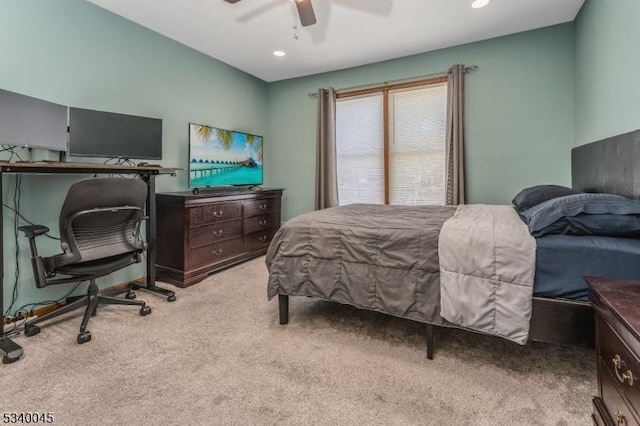 bedroom with a ceiling fan, recessed lighting, and light colored carpet