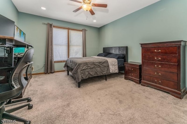 bedroom featuring recessed lighting, light colored carpet, ceiling fan, and baseboards