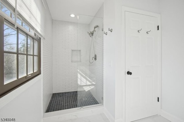 full bathroom featuring a stall shower