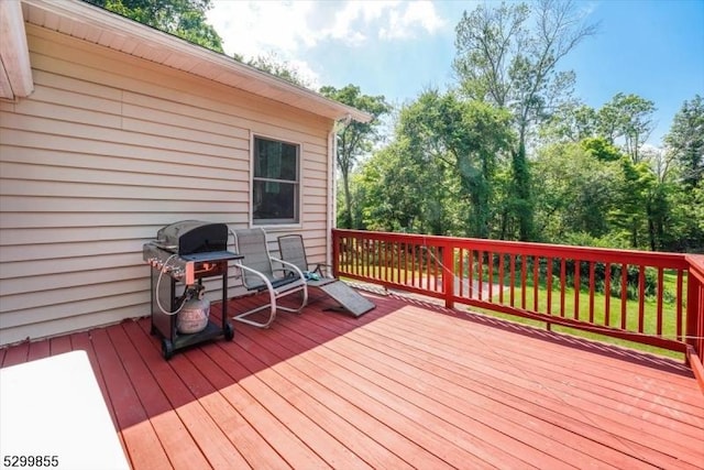 deck featuring a grill