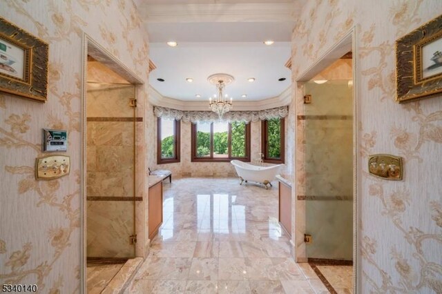 full bathroom featuring a freestanding bath, crown molding, a shower with shower door, and wallpapered walls