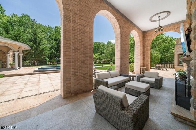 view of patio featuring an outdoor hangout area and outdoor dining space