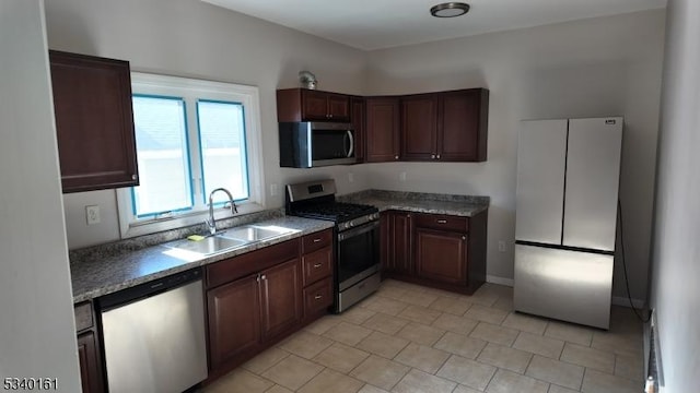 kitchen featuring stainless steel appliances and a sink