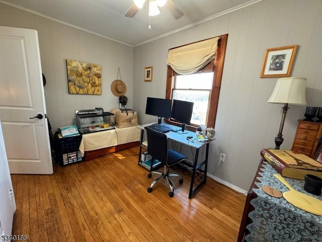 office space featuring ornamental molding, ceiling fan, and hardwood / wood-style floors