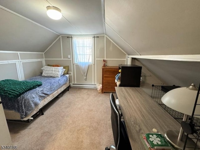 bedroom with a baseboard heating unit, vaulted ceiling, and light colored carpet