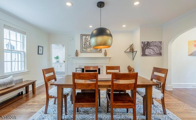 75 Crest Dr, South Orange Village Twp, NJ 07079 - dining space featuring arched walkways, light wood finished floors, baseboards, recessed lighting, and ornamental molding
