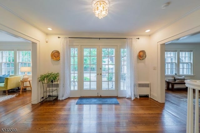 75 Crest Dr, South Orange Village Twp, NJ 07079 - doorway to outside featuring radiator, plenty of natural light, hardwood / wood-style flooring, and ornamental molding