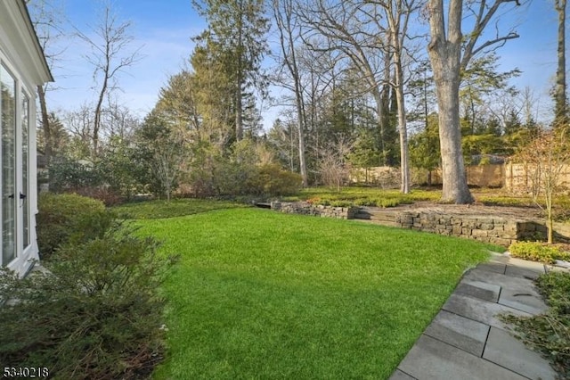 view of yard featuring fence