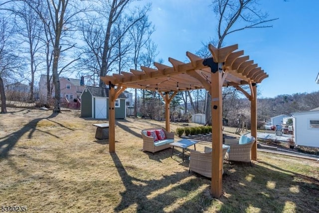 view of yard with a storage shed, an outdoor structure, an outdoor living space, and a pergola