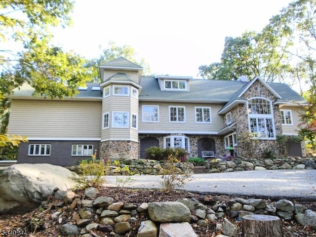 view of front of home with stone siding