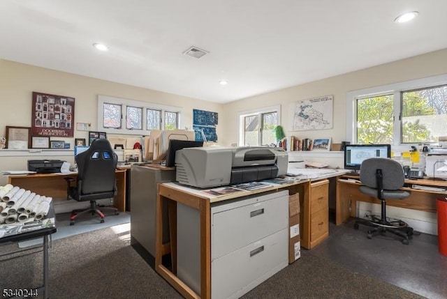 office area featuring visible vents and recessed lighting