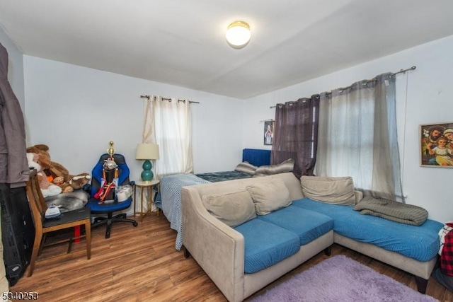 bedroom with wood finished floors