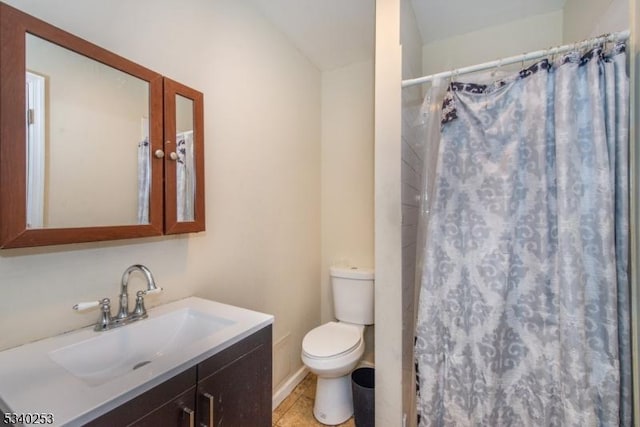 full bath featuring toilet, curtained shower, tile patterned floors, and vanity