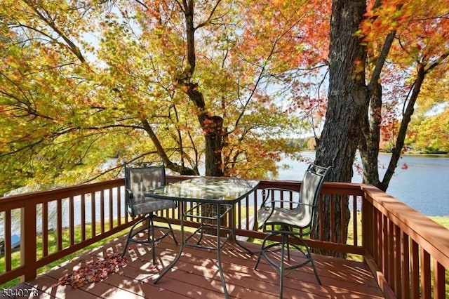 deck featuring a water view