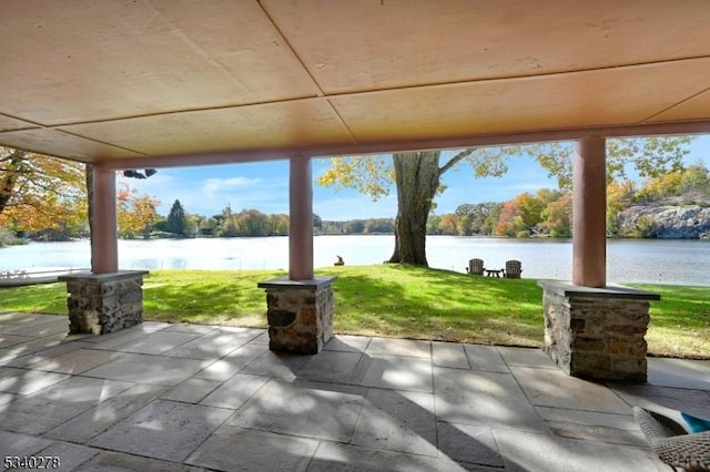 view of patio / terrace featuring a water view