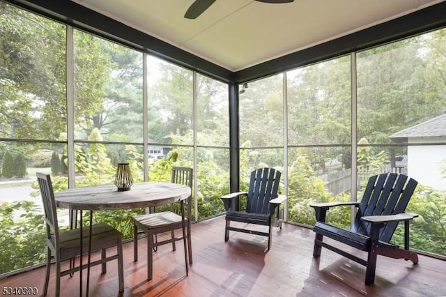 sunroom / solarium with ceiling fan