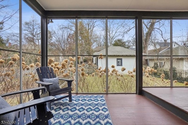 unfurnished sunroom with a wealth of natural light