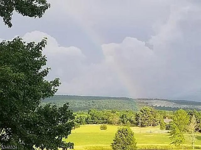 property view of water with a rural view