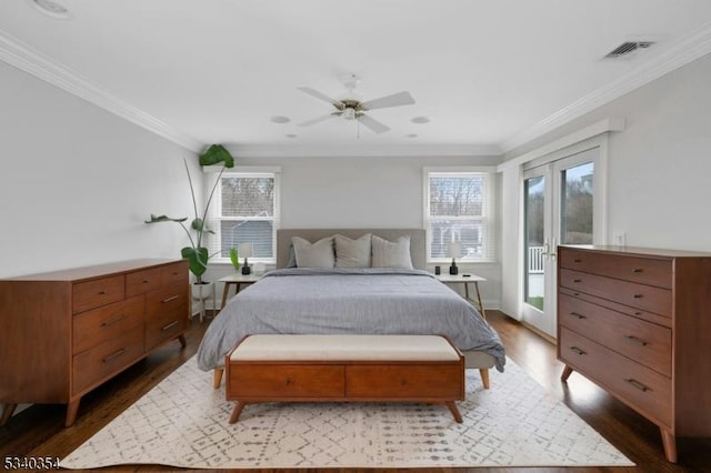 bedroom featuring visible vents, a ceiling fan, wood finished floors, access to outside, and crown molding