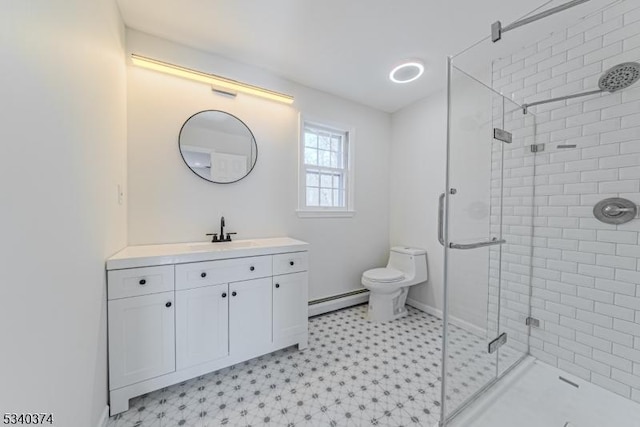 full bathroom featuring a stall shower, a baseboard radiator, vanity, and toilet