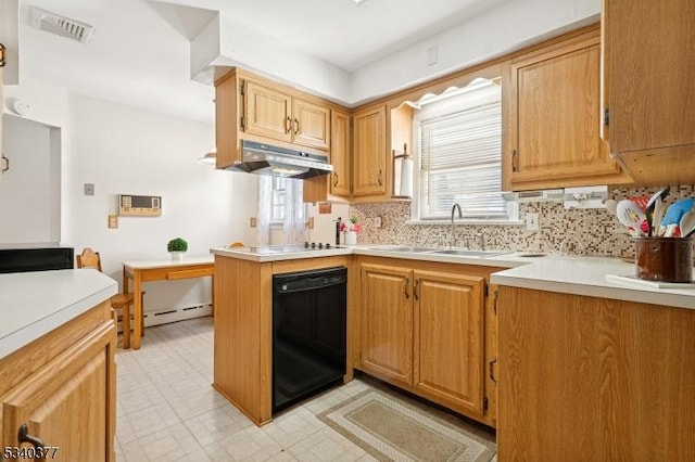 kitchen with visible vents, light countertops, a sink, dishwasher, and under cabinet range hood