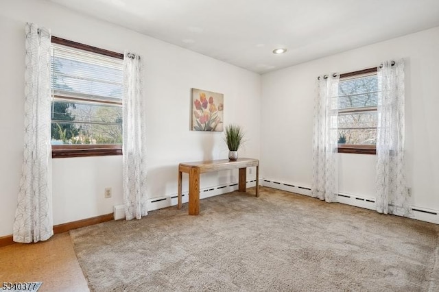 interior space with recessed lighting and baseboards