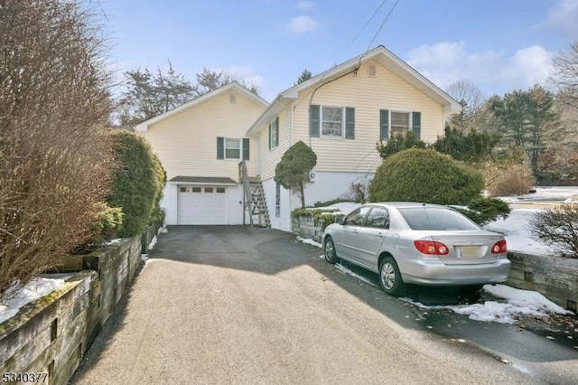 view of front of home featuring driveway and an attached garage