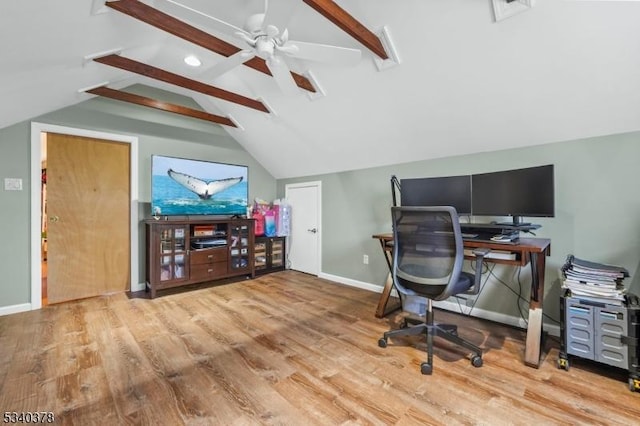 office space with lofted ceiling with beams, wood finished floors, visible vents, and baseboards