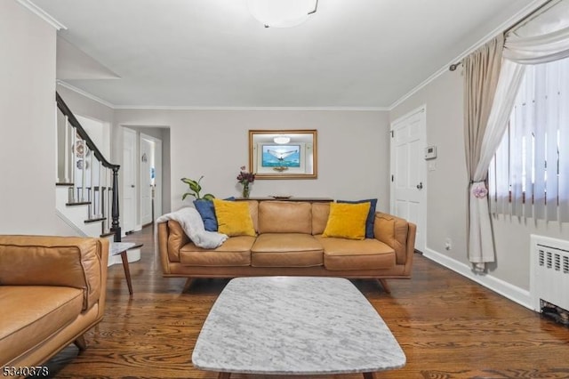 living room with ornamental molding, radiator, stairway, and dark wood-style flooring