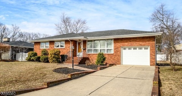 single story home with a garage, concrete driveway, and brick siding