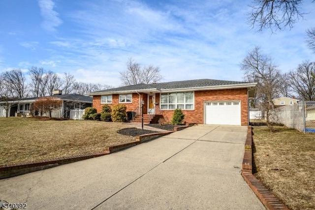 ranch-style home with driveway, a garage, fence, and brick siding