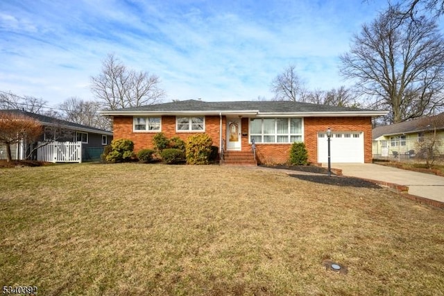 ranch-style home with brick siding, concrete driveway, a front yard, fence, and a garage