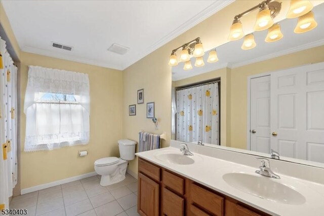 bathroom featuring tile patterned flooring, a sink, visible vents, and radiator